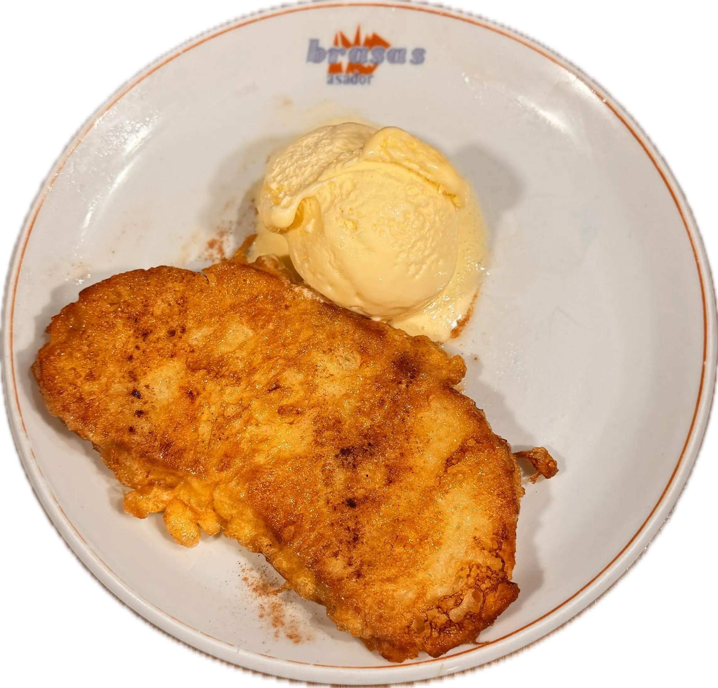 Plato con torrija y una bola de helado de vainilla
